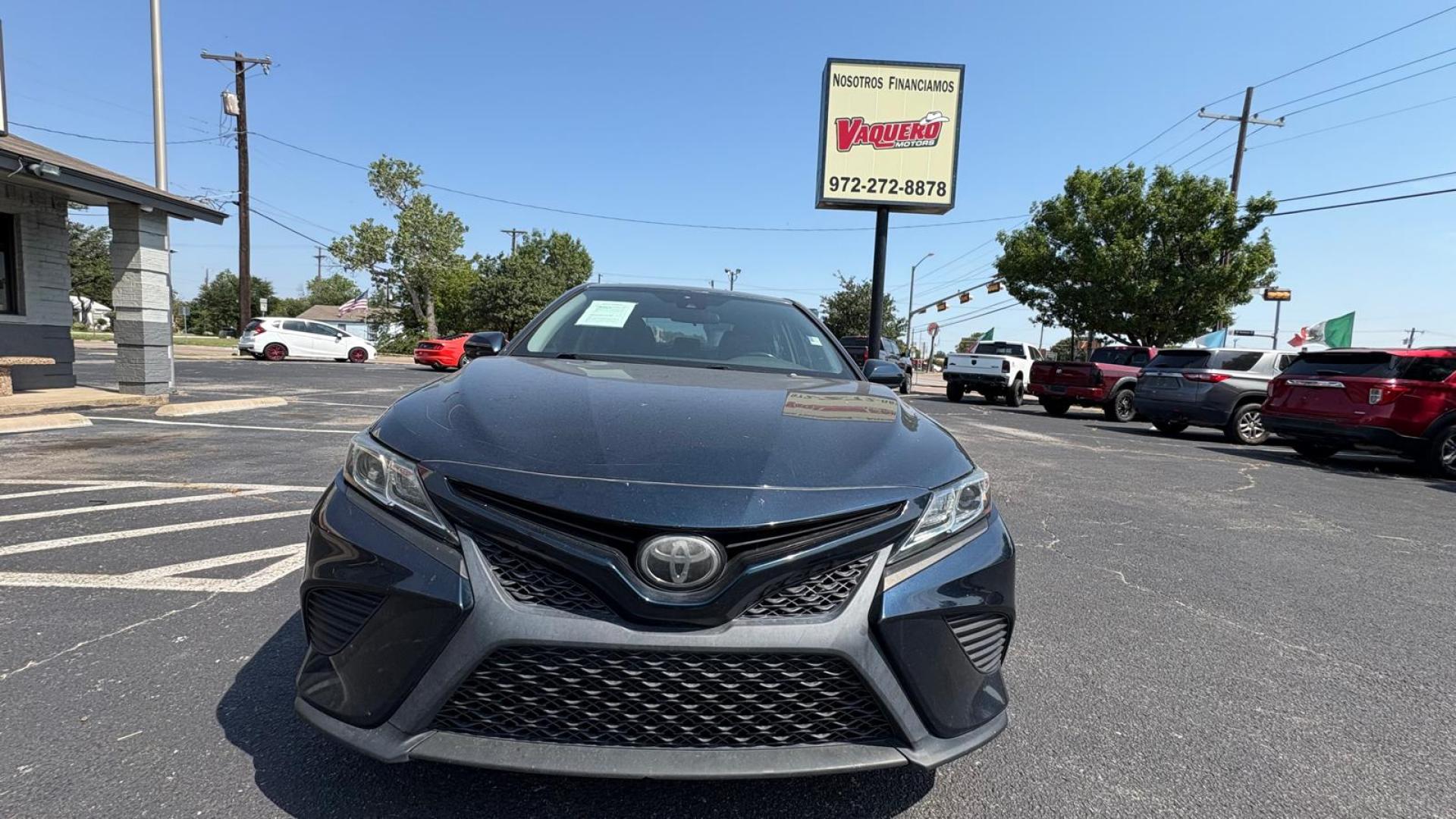 2019 Blue Toyota Camry LE (4T1B11HK2KU) with an 2.5L L4 DOHC 16V engine, 8A transmission, located at 945 E. Jefferson Blvd, Dallas, TX, 75203, (214) 943-7777, 32.752514, -96.811630 - Photo#1